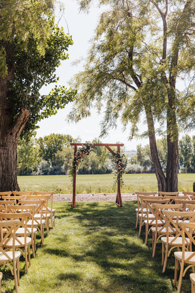 wedding, Idaho, photographer, Idaho wedding venue, Idaho wedding photographer, Boise Idaho photographer, Eagle Idaho wedding, Boise wedding venue, Treasure Valley wedding, Idaho event venue, natural light photographer, romantic wedding photographer, outdoor wedding venue, romantic bridal portraits, elegant wedding inspiration, soft wedding color palette, wedding ceremony arch, wedding day details, bride and groom portraits, walk down the aisle, wedding floral design, spring wedding inspiration, summer wedding ideas, fall wedding color palette