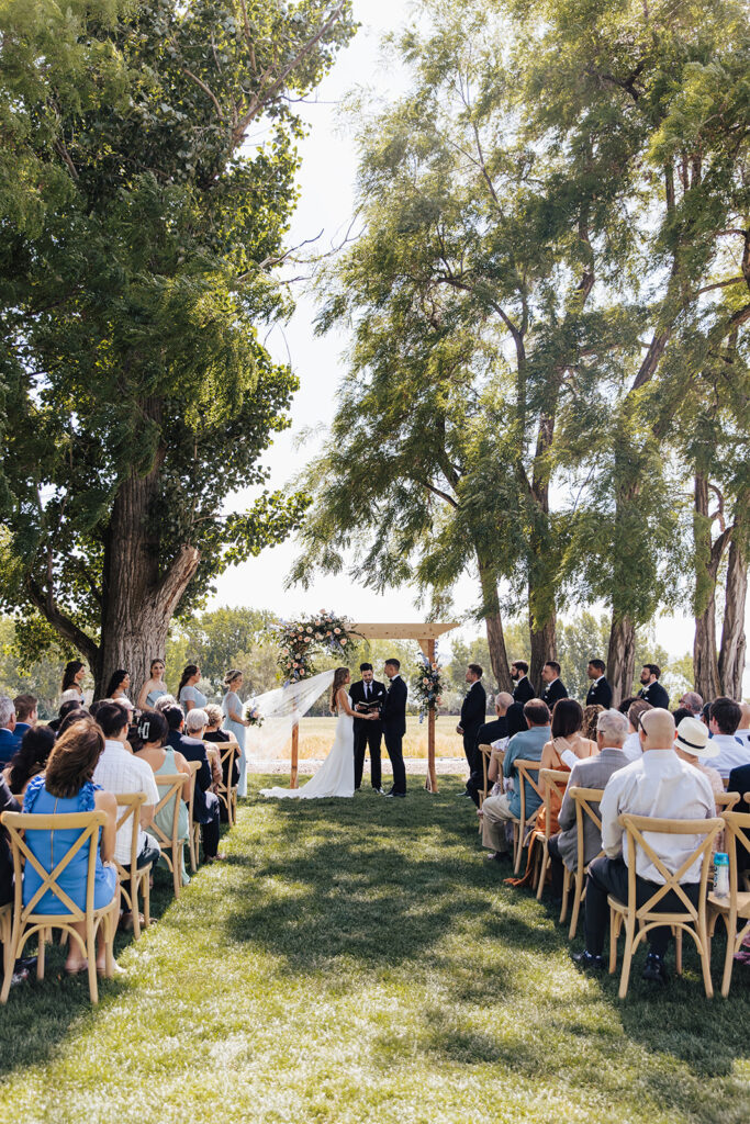 wedding, Idaho, photographer, Idaho wedding venue, Idaho wedding photographer, Boise Idaho photographer, Eagle Idaho wedding, Boise wedding venue, Treasure Valley wedding, Idaho event venue, natural light photographer, romantic wedding photographer, outdoor wedding venue, romantic bridal portraits, elegant wedding inspiration, soft wedding color palette, wedding ceremony arch, wedding day details, bride and groom portraits, walk down the aisle, wedding floral design, spring wedding inspiration, summer wedding ideas, fall wedding color palette