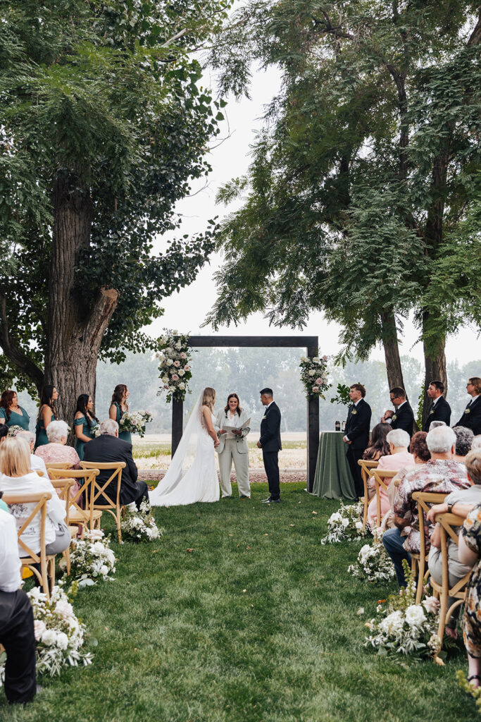 wedding, Idaho, photographer, Idaho wedding venue, Idaho wedding photographer, Boise Idaho photographer, Eagle Idaho wedding, Boise wedding venue, Treasure Valley wedding, Idaho event venue, natural light photographer, romantic wedding photographer, outdoor wedding venue, romantic bridal portraits, elegant wedding inspiration, soft wedding color palette, wedding ceremony arch, wedding day details, bride and groom portraits, walk down the aisle, wedding floral design, spring wedding inspiration, summer wedding ideas, fall wedding color palette